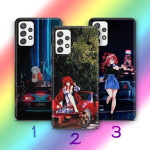May include: Three smartphone cases featuring anime-style characters and sports cars. Case 1 shows a character on a blue car. Case 2 features a red-haired character on a red car with the text PLAY. Case 3 depicts a character standing by a car.
