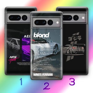 May include: Three phone cases with car-themed designs. One case features a white car with the text "WHITE FERRARI" and Japanese text. Another case has a purple car graphic and the text "AE86". The third case has a car graphic and the word "GODZILLA".
