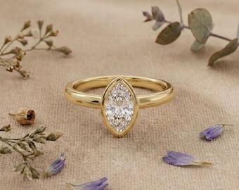 Pierścionek zaręczynowy z diamentami hodowanymi w laboratorium Marquise, oprawiony w ramkę, minimalistyczny solitaire