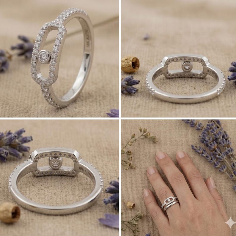 May include: A silver ring with a unique design, featuring a central oval-shaped element and a smaller, round gemstone. The band is adorned with small, sparkling stones. The ring is shown from multiple angles, highlighting its intricate details.
