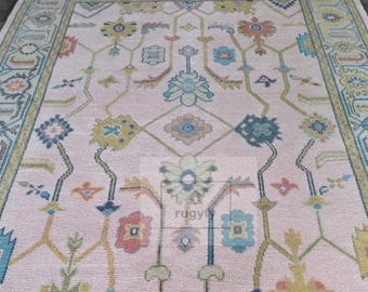 Hand-Knotted Pink Oushak Wool Rug: Turkish Floral Rug (8x10)