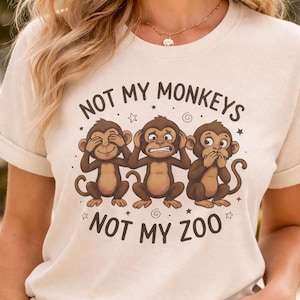 May include: A white ceramic mug with a black handle and the text "But First, Coffee" in a handwritten style. The mug is on a white surface. The mug is approximately 10 cm tall.