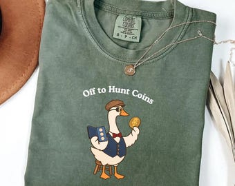 Camiseta Comfort Colors® con estampado de ganso coleccionista de monedas, ideal para la caza de monedas.