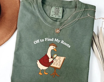 Camiseta Comfort Colors® "Genealogy Goose Off to Find My Roots" (Genealogía: Ganso en busca de mis raíces), camiseta para aficionados a la historia familiar.