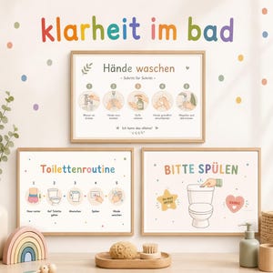 Könnte beinhalten: Drei gerahmte Lernposter mit buntem Text und Illustrationen für Badroutinen. Das obere Poster zeigt Schritte zum Händewaschen, das unten links Toilettenroutinen und das unten rechts eine Toilette mit dem Text BITTE SPÜLEN.