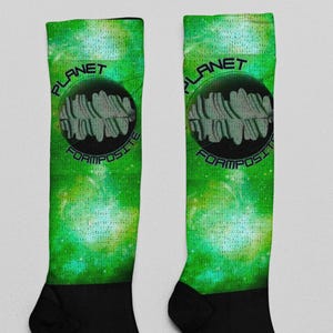 Calzini Planet Foams, abbinati alle sneakers Foamposite verde pino