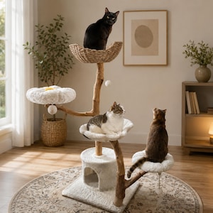 May include: A multi-level cat tree featuring a natural wood trunk structure with a woven basket top, three white plush flower-shaped platforms, and a square base with a small enclosed cubby. Three cats are positioned on the various levels.