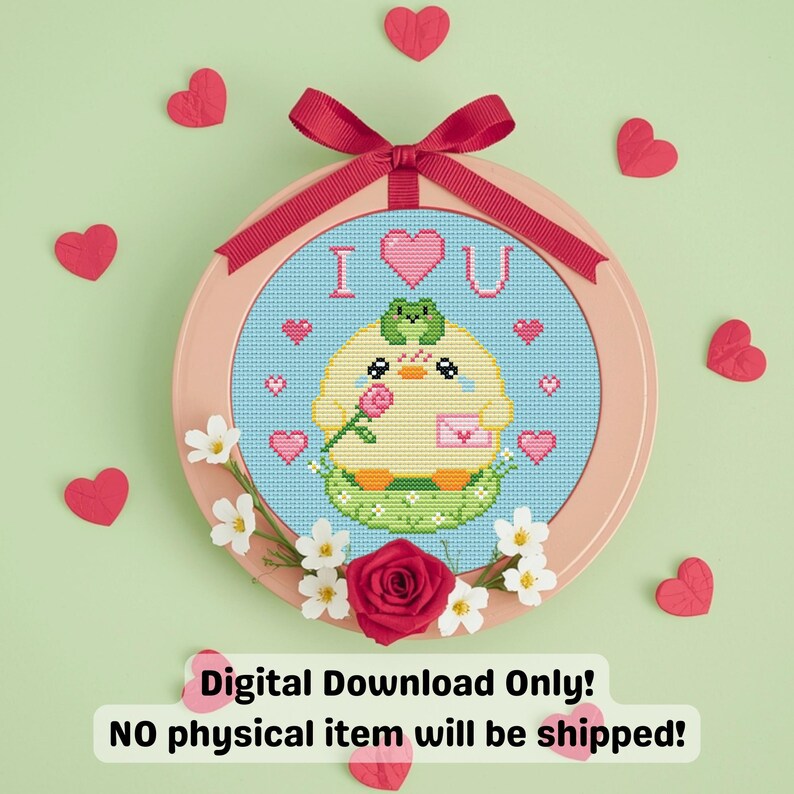 May include: A cross-stitch hoop art piece with a cute yellow chick holding a rose and a letter, surrounded by hearts. The text "I ❤️ U" is stitched above the chick. The hoop is decorated with a red bow, flowers, and red heart cutouts.