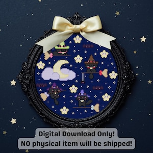 May include: A framed cross-stitch featuring cartoon black cats wearing witch hats, flying on brooms, and surrounded by stars and a crescent moon. The artwork is set against a dark blue background and framed in a black oval frame with a cream-colored bow.