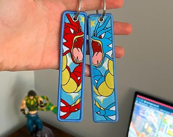 Porte-clés anime brodé jet tag recto-verso