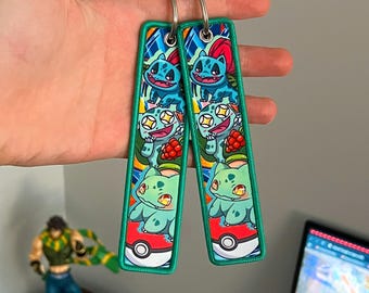 Porte-clés anime brodé jet tag recto-verso