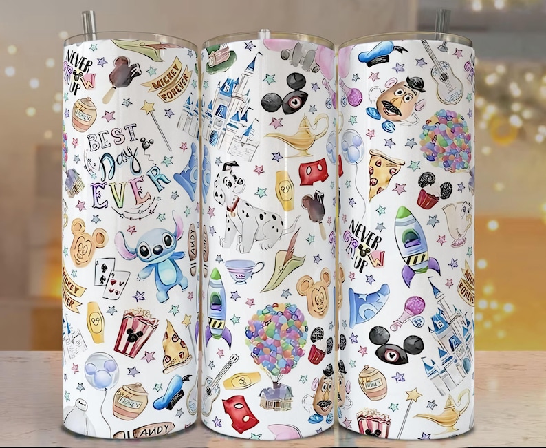 May include: Three white insulated tumblers with colorful Disney-themed illustrations. The designs include characters like Stitch, Mickey Mouse, and Dalmatian, along with the text "Best Day Ever" and "Never Grow Up."