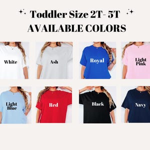 The image is a collage of eight different colored toddler size t-shirts, each with a different color and size.