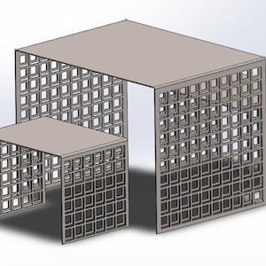 May include: A set of three modern tables with a geometric design. The tables are a light gray color and feature a repeating square pattern throughout the sides. The set includes a large table and two smaller side tables.