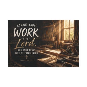 May include: A rectangular wall art print featuring the text 'COMMIT YOUR WORK TO THE LORD, AND YOUR PLANS WILL BE ESTABLISHED. PROVERBS 16:3' overlaid on a dark, rustic woodworking shop scene with wooden planks, tools, and sunlight from a window.