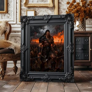 May include: A framed artwork featuring a muscular warrior with an axe, standing before an army. The painting has a fiery orange and red sky. The black ornate frame adds a classic touch to the artwork, which is displayed on a wooden floor.