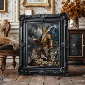 May include: A framed artwork featuring a warrior in golden armor, holding a book and a hammer, set against a mountainous backdrop with lightning. The black ornate frame adds a classic touch to the fantasy-themed painting.