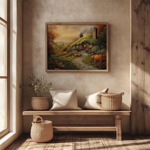 May include: A framed painting depicts a hobbit hole scene with pumpkins and a stone path. The painting hangs above a wooden bench with pillows and woven baskets. The room has a rustic, warm aesthetic with natural light.