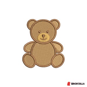 May include: A machine-embroidered teddy bear design in shades of brown and tan. The bear has a smiling face, round ears, and rounded limbs. The design is suitable for baby items, children's clothing, or nursery decor.