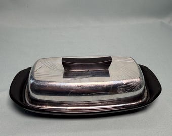 Mantequera y tapa de plástico plateado y negro