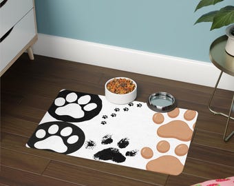 Tapete para comida para mascotas con estampado de huellas de patas / 12 x 18