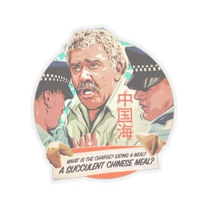 May include: A sticker featuring a cartoon illustration of a man being arrested by two police officers. The man is wearing a light green shirt and has a moustache. The text on the sticker reads "WHAT IS THE CHARGE? EATING A MEAL? A SUCCULENT CHINESE MEAL?" in red and white text.