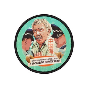 May include: Circular patch with a black edge. The design features a cartoon of a man being questioned by two police officers. Text on the patch reads "WHAT IS THE CHARGE? EATING A MEAL? A SUCCULENT CHINESE MEAL?" and "中国海".