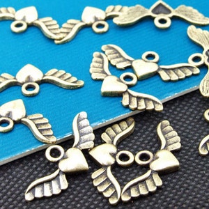 50pcs Superb Bronze Filigree Carved angel wings Findings Pendants 10mmx28mm A image 3