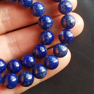 Lapis Lazuli Gemstone Beads: Round, Smooth, Untreated, 8.2-8.4mm, 15&quot; Strand