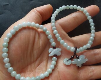 Pulsera de caballo de jadeíta: jade, dije de granate, poni del zodiaco