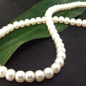 Loose White 6mm-8mm  freshwater cultured Pearl beads  One STRAND