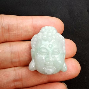 Hand-Carved Jadeite Buddha Head Pendant: Natural Gemstone Amulet
