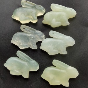 Carved Xiuyu Jade Rabbit Pendant: Natural White Stone Amulet