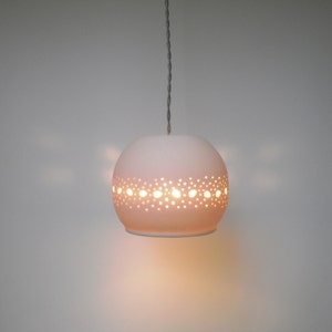 Small porcelain ball with lace