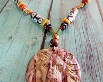 Leather necklace with jasper carved Lion 50 mm Ghana beads