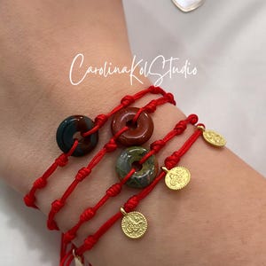 May include: A rustic wooden sign with the text "Welcome to our porch" in white lettering. The sign features a distressed finish and a simple, inviting design, perfect for outdoor decor.