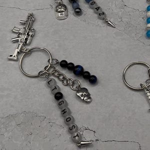 Paquete 141 y colgantes para bolsos King - COD - Kortac - Taskforce - Militar