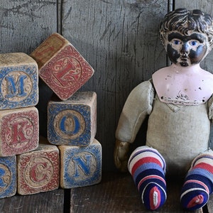 Primitive Antique Tin Minerva Doll with Cloth Body and Colorful Striped Socks image 1