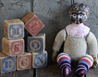 Primitive Antique Tin Minerva Doll with Cloth Body and Colorful Striped Socks
