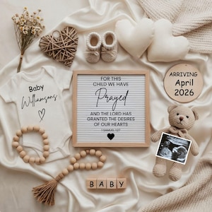 May include: A baby announcement with a white onesie, a letter board with a Bible verse, and a wooden sign indicating April 2026. The image includes baby shoes, a teddy bear, and an ultrasound scan. The onesie says "Baby Williamsons".