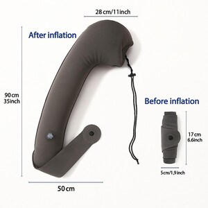 May include: A gray inflatable travel pillow, shown inflated and deflated. The inflated pillow is 35 inches long and 11 inches wide. The deflated pillow is 6.6 inches long and 1.9 inches wide. A black drawstring is attached.