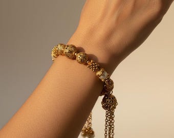 Antique Beaded Bracelet With Jhumka Tassel Drops | Matte Gold Plated Adjustable