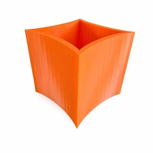 May include: A bright orange square planter with a concave, curved side design and a hollow center. The exterior surface features a series of vertical ridges that run from the top rim down to the base, creating a textured, geometric appearance.