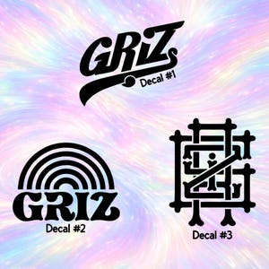 May include: Three black vinyl decals featuring the word GRIZ in different styles. Decal #1 has a stylised script font, Decal #2 features a rainbow arch above the text, and Decal #3 displays the letters in a complex, interlocking geometric design.