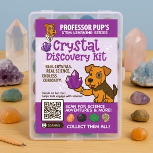 May include: A clear plastic case containing a "Professor Pup's Crystal Discovery Kit". The kit features a cartoon dog holding a purple crystal. Text includes "Real Crystals. Real Science. Endless Curiosity." and "Collect Them All!"