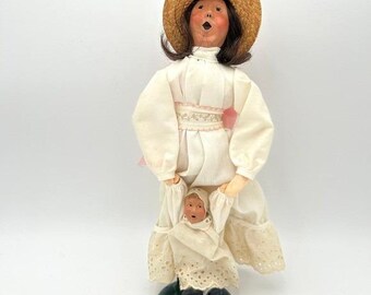Vintage 1992 13" Caroler Figurine Woman Holding Baby Straw Hat Easter Decor
