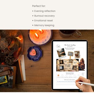 May include: A wooden table displays a lit candle in a glass container, a purple candle, and a blue flower-shaped dish with a pink candle. A tablet shows a digital art project with the text "The Heart's Gallery".