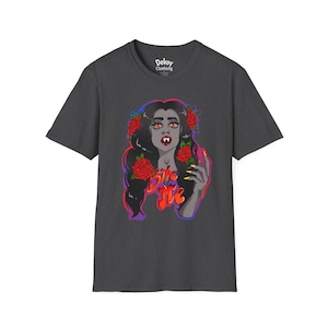 May include: Dark grey t-shirt with a graphic of a woman with black hair, red roses, and the text "Bite Me." The woman has red eyes and fangs. The shirt has the "Dekoy Clothing" logo at the top.