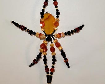 Gorgeous orangish red, yellow garden spider suncatcher, ornament, figure