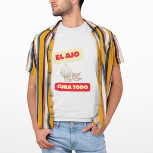 El Ajo Cura Todo, Garlic Power, Spanish, Spanglish, Healthy, Health, Unisex Softstyle T-Shirt